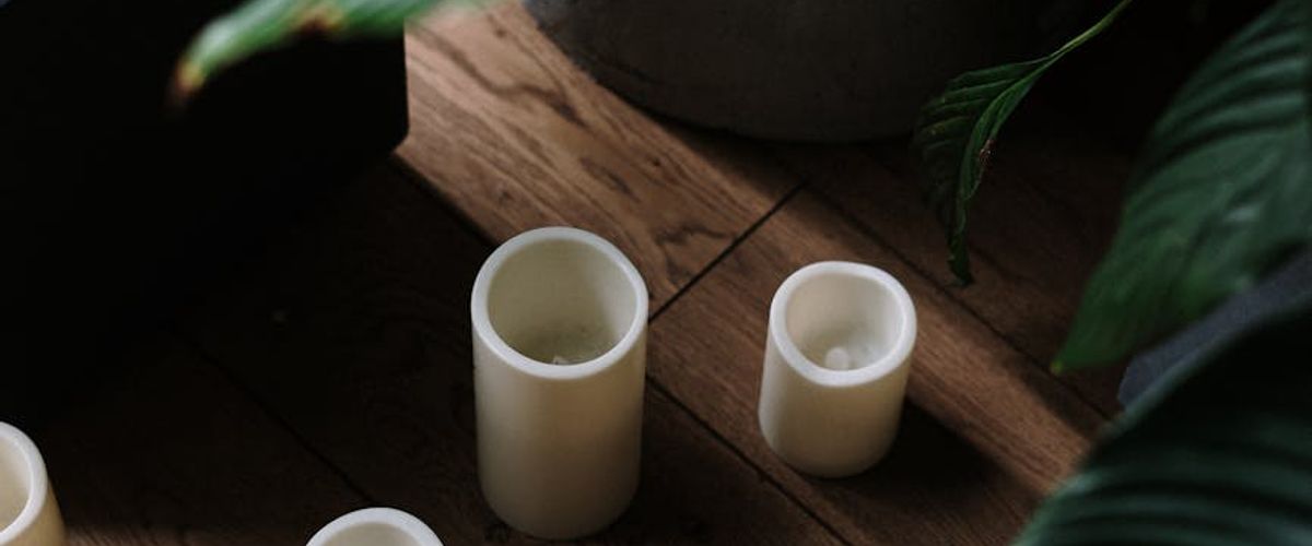 Minimalist yoga studio with warm lighting and wooden elements